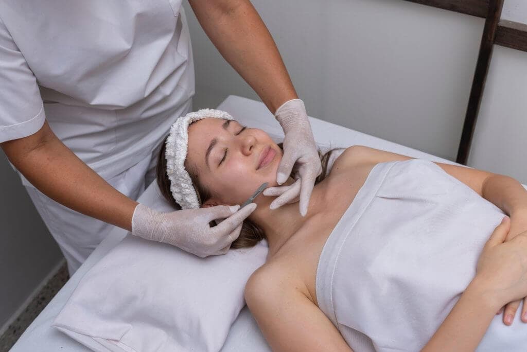 Young Female Getting Dermaplanning Treatment | Luminous Skin Care Studio in Santa Clara, CA