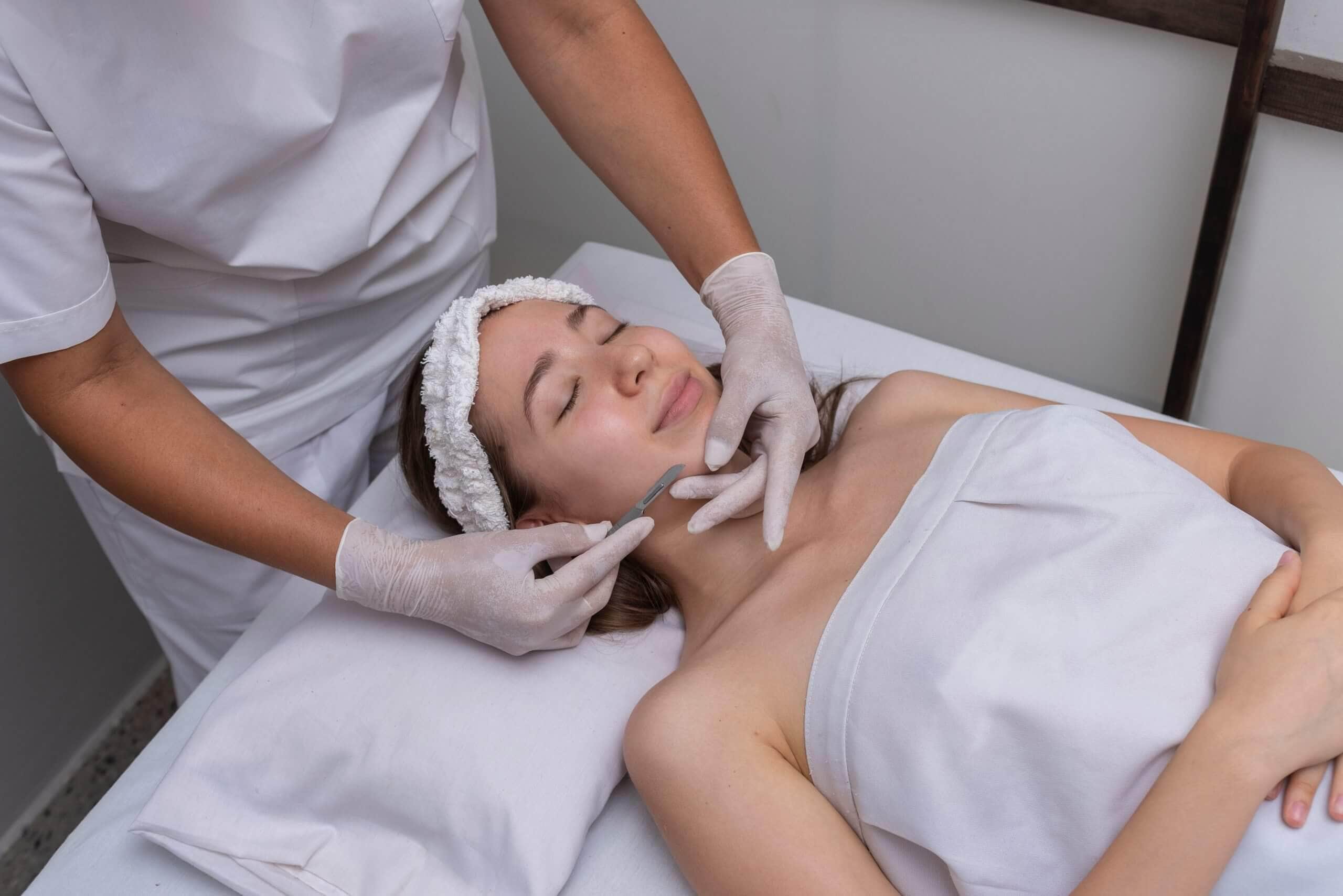 Young Female Getting Dermaplanning Treatment | Luminous Skin Care Studio in Santa Clara, CA