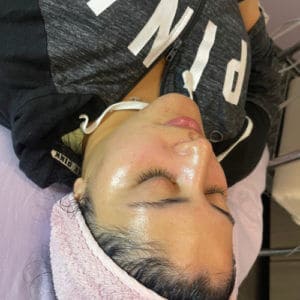Young Female Getting Hydrofacial Treatment | Luminous Skin Care Studio in Santa Clara, CA