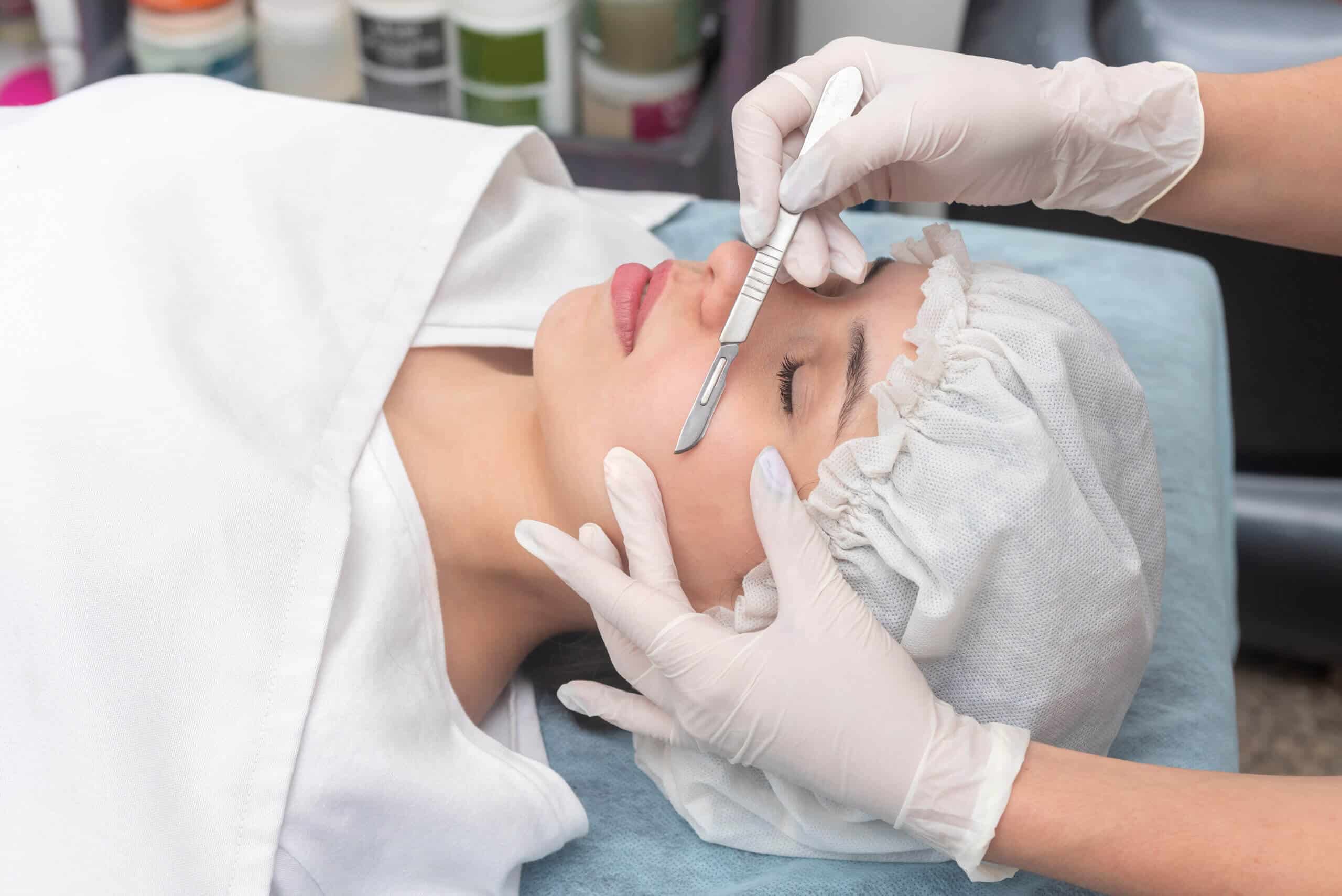 A Young woman getting Dermaplaning Treatment | Luminous Skin Care in Santa Clara, CA